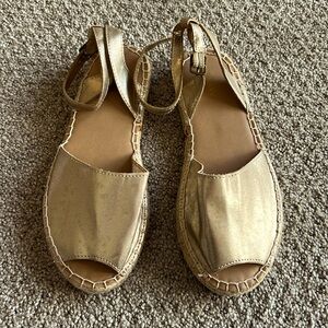 NWOT Gold Sandals with ankle buckles. Size 1